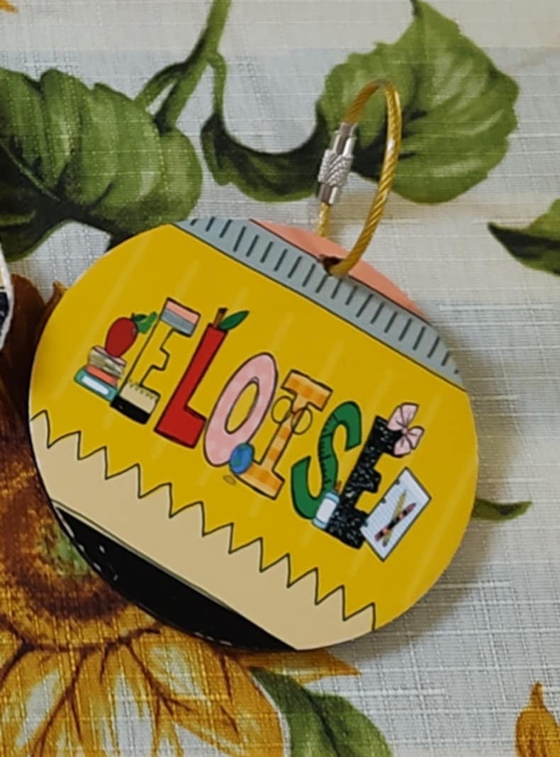 Personalized backpack tag and metal bookmark