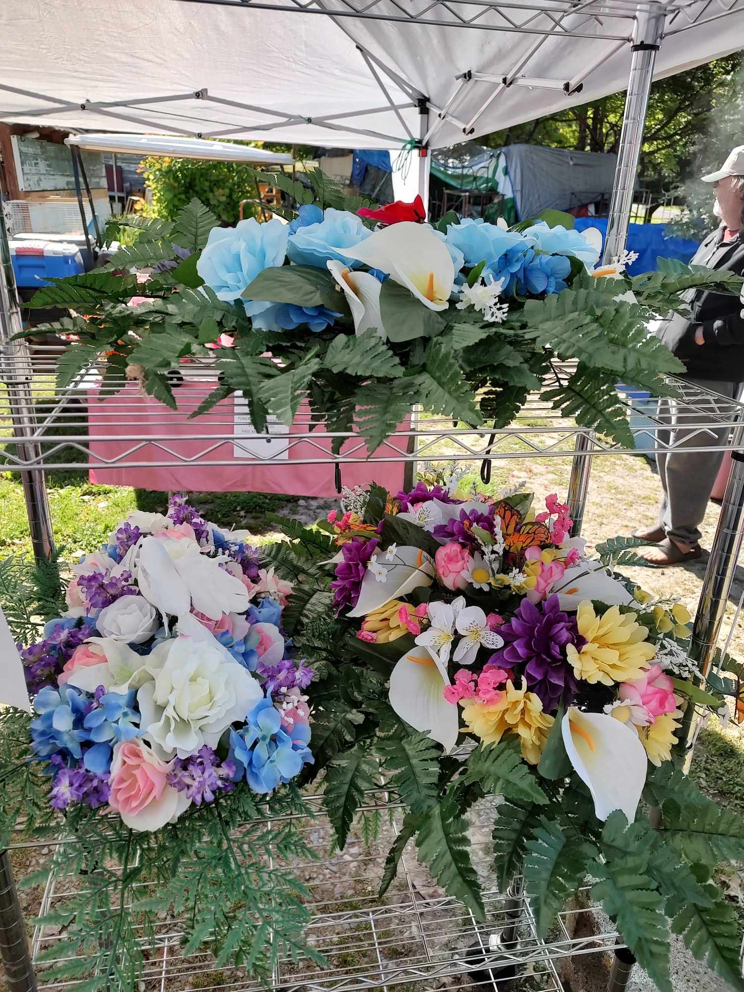 Cemetery grave saddles and vase arrangements