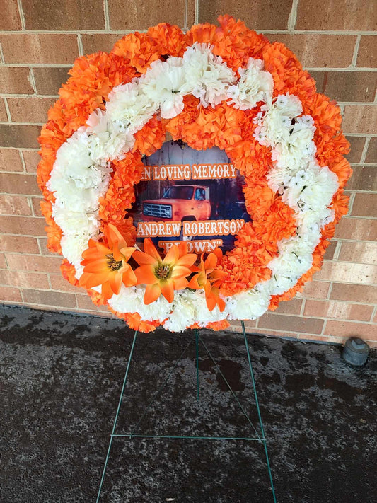 Round funeral arrangement wreath with photo and personalization