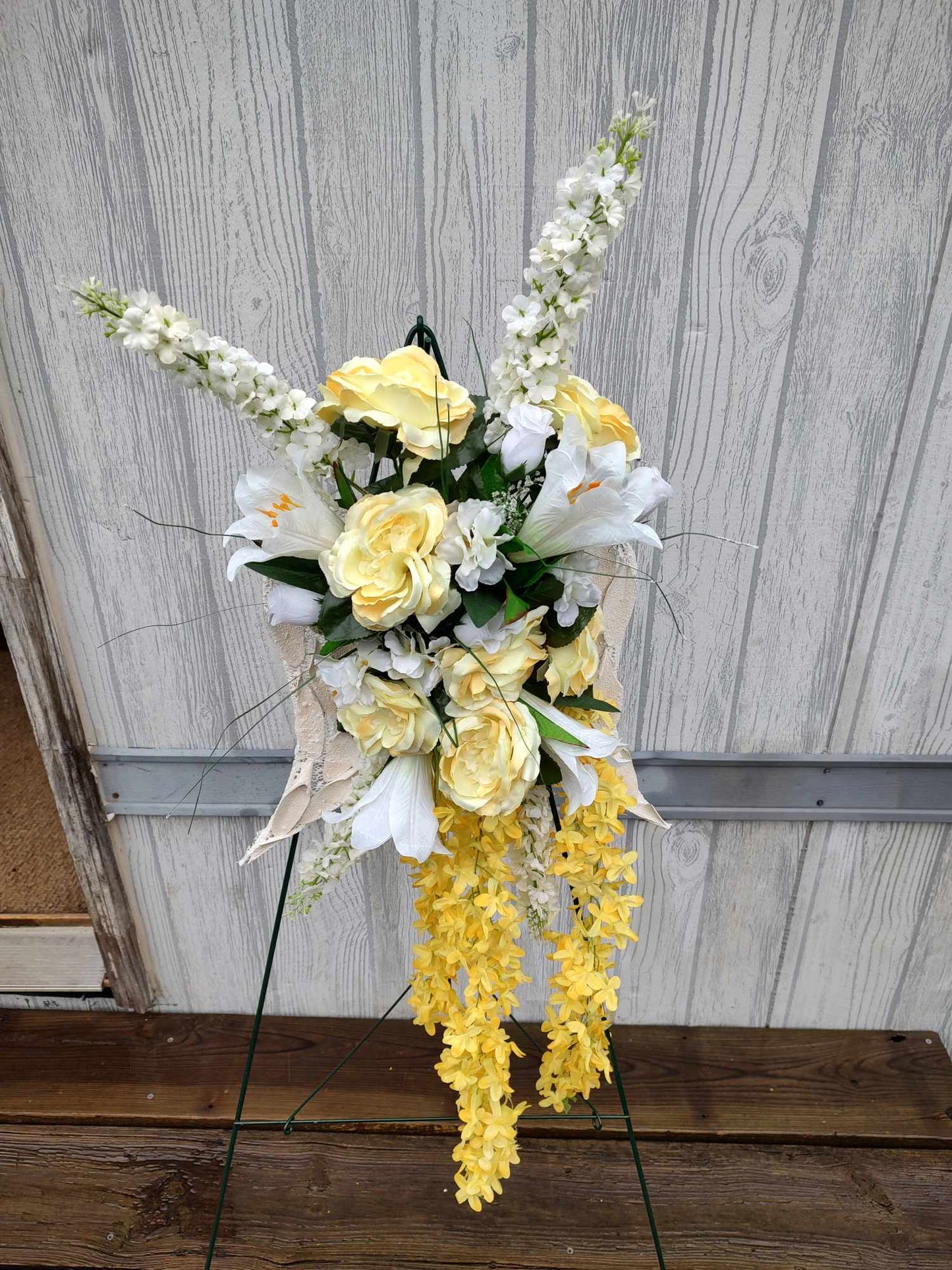 White angel wings funeral arrangement