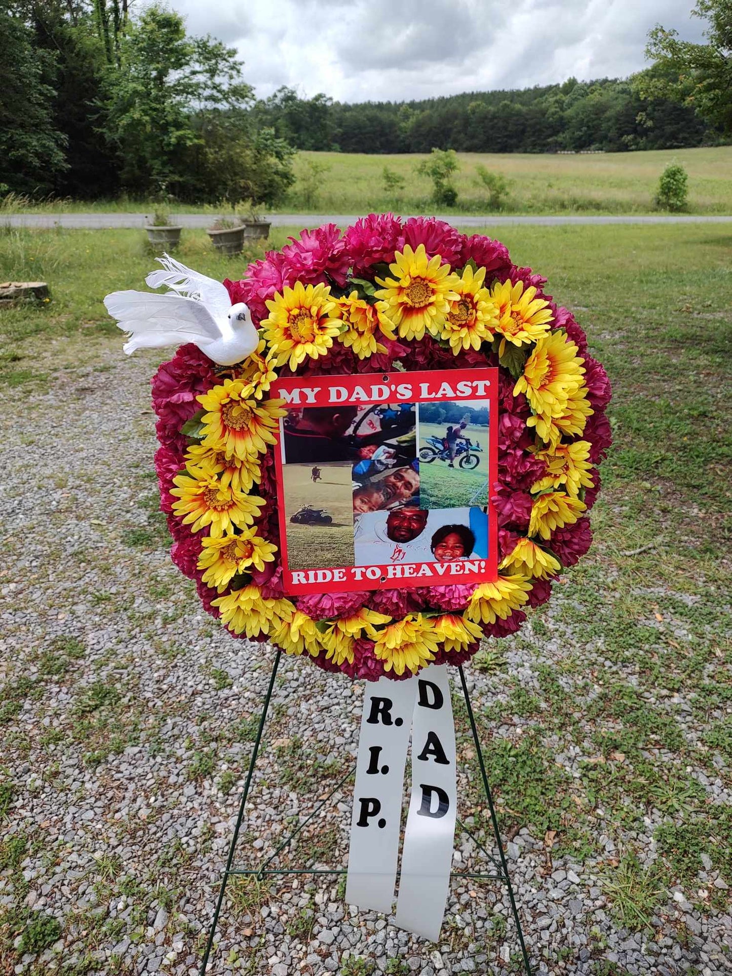 Round funeral arrangement wreath with photo and personalization