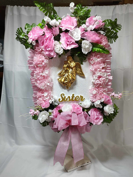 Sister pink angel funeral arrangement in stock