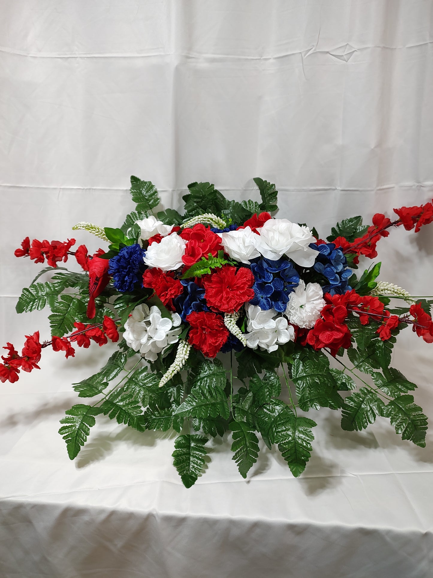 Red white and blue cemetery grave saddle